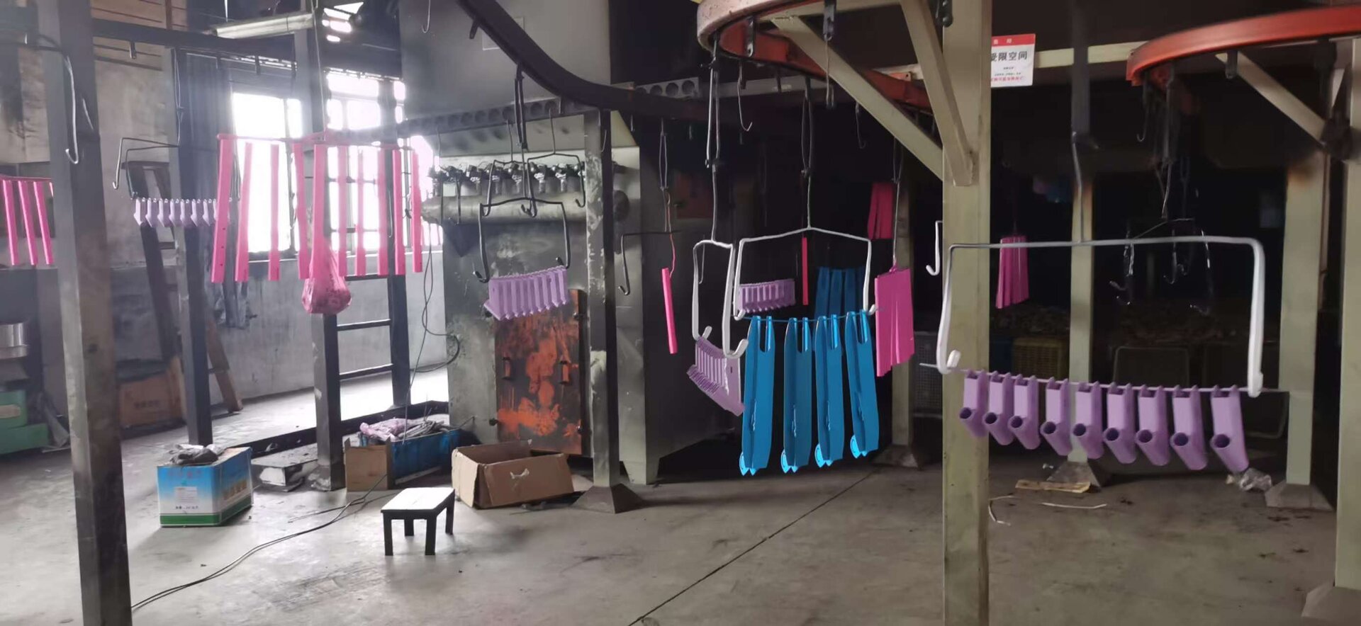 Yeatru Supplier Factory Production Line — Real Photo of PPE Clothing Being Hang-Dried